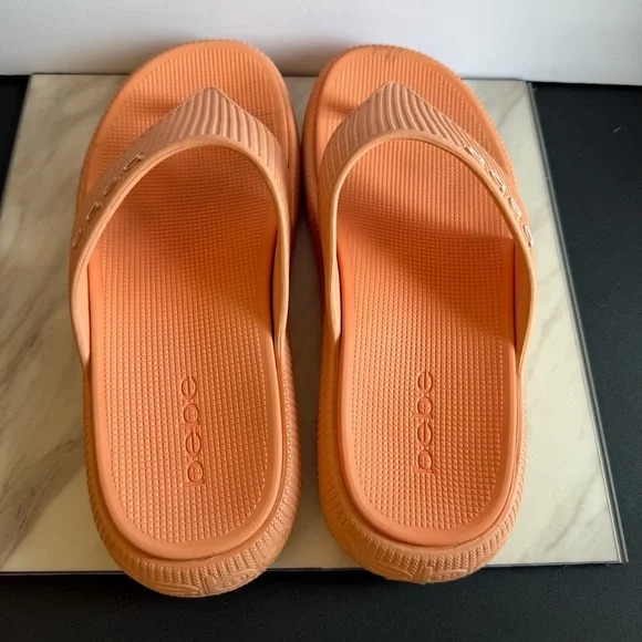 Bebe Vibrant Orange Rubbery Flip Flops - Picture 4 of 6